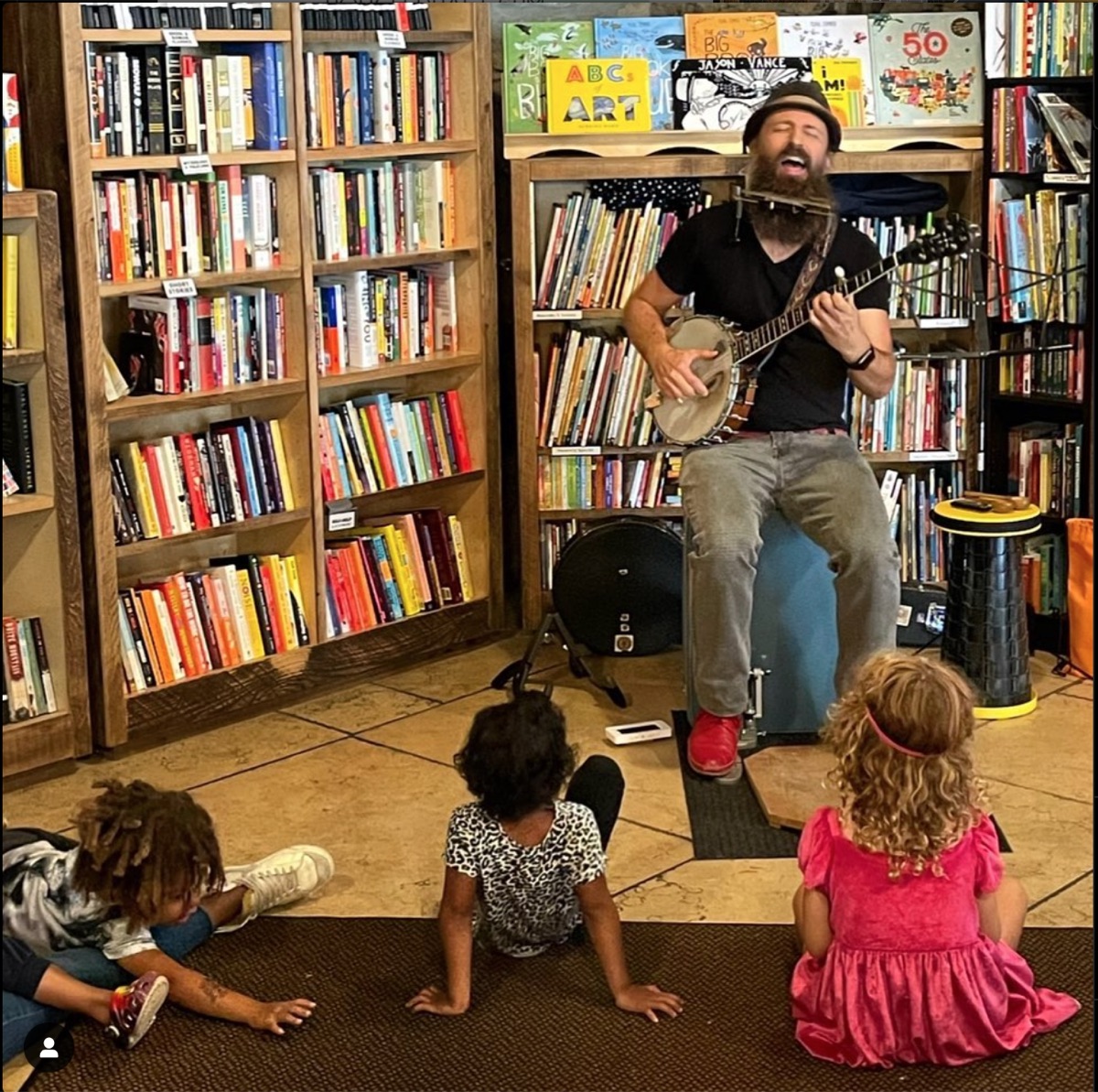 Jason performing for kids at a bookstore